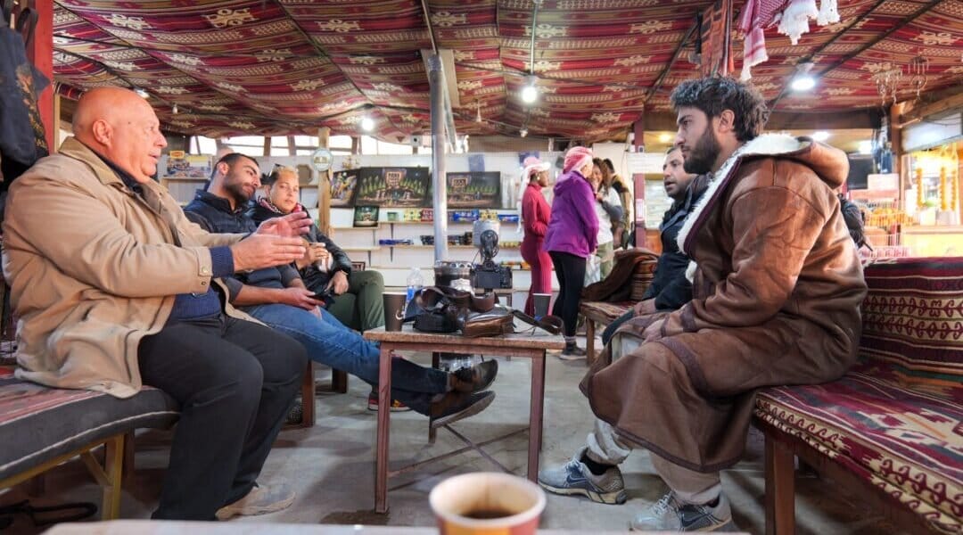 The crew takes a tea break and was invited inside to 