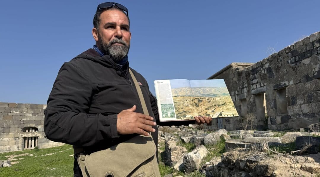 Ahmad was born in these ruins, and wishes he could live there again. Instead, he now serves as a tour guide to the sacred place of his origin. 